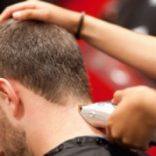 Close up of a male student having a haircut